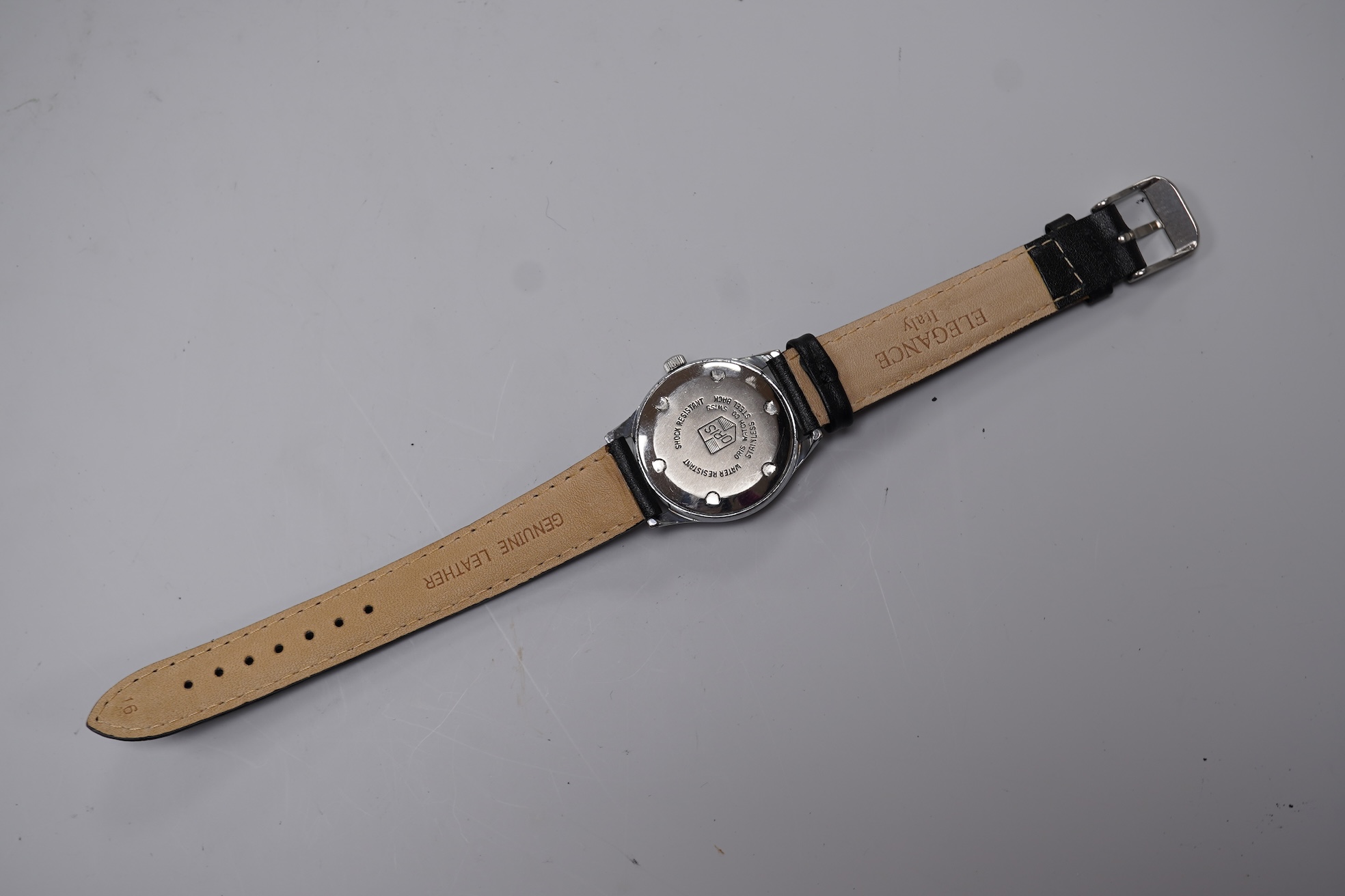 A gentleman's stainless steel backed Oris manual wind calendar wrist watch, with black Arabic dial, subsidiary seconds and date indicator hand, case diameter 32mm, on an associated leather strap, no box or papers.